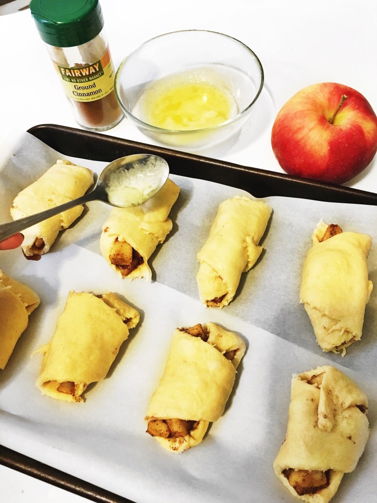 Ingredients: Apples Tube of crescent roll dough Cinnamon Sugar Butter